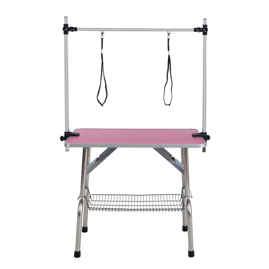 36 inch folding pet grooming table with stainless steel frame and rubber pad, equipped with adjustable armrests and clips (pink)